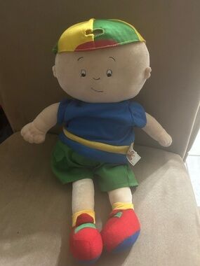 Plush Caillou Doll with Colorful Cap and Green Shorts - Multicolor